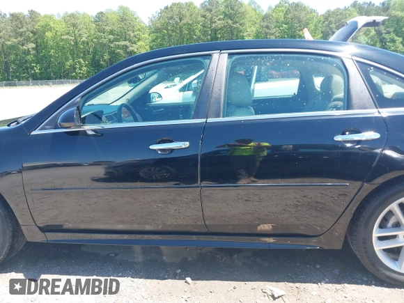 2014 Chevrolet Impala LTZ with VIN 2G1WC5E39E1168726, listed as a IAAI auction lot 42133295 with 146,902 mi miles and . Bid and sale history available at DreamBid. Image 14.