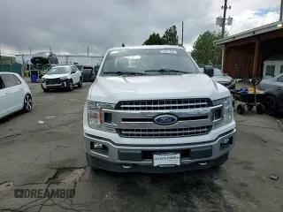 2019 Ford F-150 XL with VIN 1FTFW1E53KFC70522, listed as a Copart auction lot 55631445 with 117,292 mi miles and Salvage title. Bid and sale history available at DreamBid. Image 13.