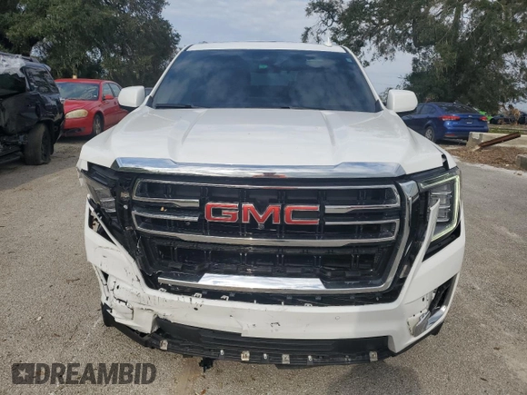 2023 GMC Yukon SLT with VIN 1GKS2BKD3PR278528, listed as a Copart auction lot 74959104 with 19,951 mi miles and Salvage Title. Bid and sale history available at carsss.com. Image 5.