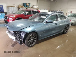 2019 BMW 3 Series 330i with VIN WBA5R1C51KFH14244, listed as a Copart auction lot 52199945 with 45,365 mi miles and Salvage title. Bid and sale history available at DreamBid. Image 1.