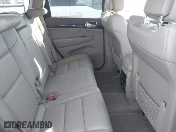 2011 Jeep Grand Cherokee 70th Anniversary with VIN 1J4RR4GTXBC718994, listed as a IAAI auction lot 41688158 with 121,680 mi miles. Bid and sale history available at carsss.com. Image 8.