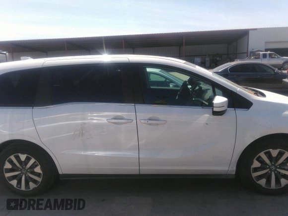 2025 Honda Odyssey EX-L z VIN 5FNRL6H6XSB039158, wystawiony jako IAAI lot #41879492 z przebiegiem 992 mil mil oraz . Historia ofert i sprzedaży dostępna na DreamBid. Obrazek 13.