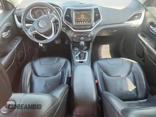 2015 Jeep Cherokee Trailhawk with VIN 1C4PJMBS4FW687328, listed as a Copart auction lot 58927765 with 119,483 mi miles and Non repairable. Bid and sale history available at DreamBid. Image 8.