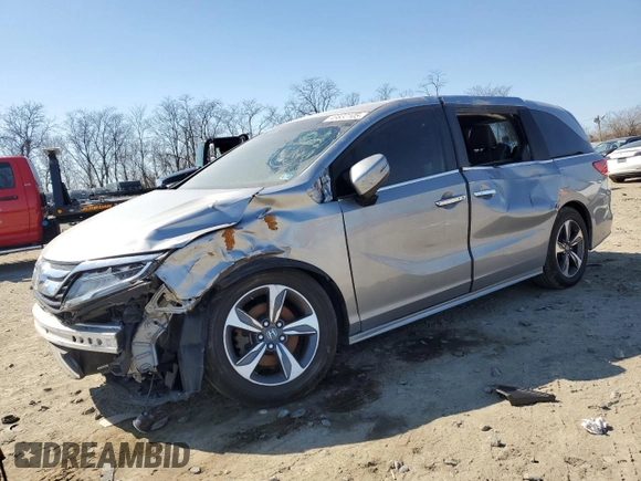 2019 Honda Odyssey Touring z VIN 5FNRL6H87KB109460, wystawiony jako Copart lot #48632105 z przebiegiem 68 604 mil mil oraz Szkoda całkowita • Salvage title. Historia ofert i sprzedaży dostępna na DreamBid. Obrazek 1.