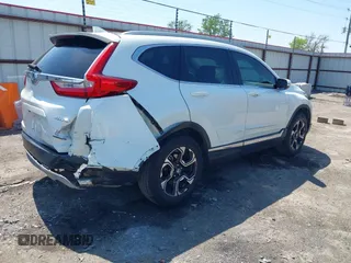 2018 Honda CR-V Touring with VIN 2HKRW2H93JH686298, listed as a IAAI auction lot 41979786 with 100,087 mi miles. Bid and sale history available at carsss.com. Image 4.