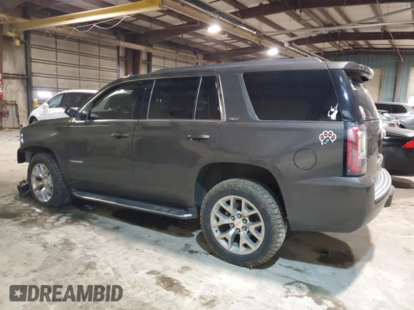2020 GMC Yukon SLT Standard Edition with VIN 1GKS2DKC5LR286112, listed as a Copart auction lot 82692994 with 87,959 mi miles and Salvage Title. Bid and sale history available at carsss.com. Image 2.