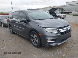 2019 Honda Odyssey Touring z VIN 5FNRL6H80KB118663, wystawiony jako IAAI lot #42117677 z przebiegiem 90 273 mil mil oraz . Historia ofert i sprzedaży dostępna na DreamBid. Obrazek 1.