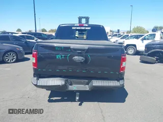2019 Ford F-150 XL with VIN 1FTEW1CP9KKD28429, listed as a IAAI auction lot 41397905 with 96,793 mi miles and . Bid and sale history available at carsss.com. Image 16.
