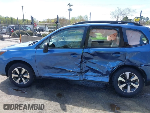 2018 Subaru Forester z VIN JF2SJABC9JH525596, wystawiony jako IAAI lot #41941424 z przebiegiem 32 622 mil mil oraz . Historia ofert i sprzedaży dostępna na DreamBid. Obrazek 14.