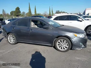 2014 Toyota Camry Hybrid LE with VIN 4T1BD1FK5EU106743, listed as a IAAI auction lot 41323019 with 84,511 mi miles. Bid and sale history available at carsss.com. Image 14.