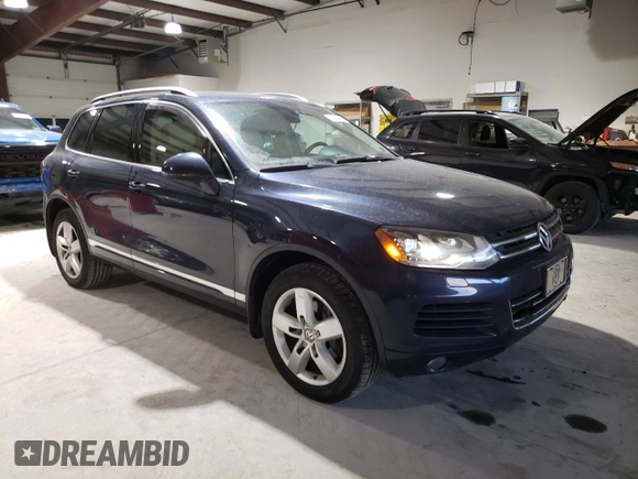 2012 Volkswagen Touareg Exec with VIN WVGEF9BP4CD011773, listed as a Copart auction lot 82461264 with 230,231 mi miles and Clean Title. Bid and sale history available at DreamBid. Image 4.