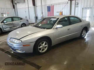 2002 Oldsmobile Aurora z VIN 1G3GR64H624240446, wystawiony jako Copart lot #52299005 z przebiegiem 110 898 mil mil oraz Tytuł czysty. Historia ofert i sprzedaży dostępna na DreamBid. Obrazek 1.