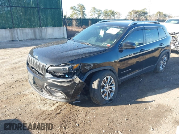 2019 Jeep Cherokee Latitude Plus with VIN 1C4PJMLB2KD261304, listed as a IAAI auction lot 41877500 with 76,442 mi miles and . Bid and sale history available at DreamBid. Image 2.