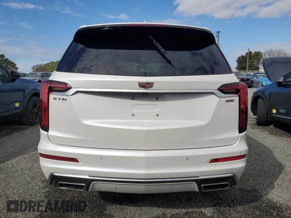 2021 Cadillac XT6 Premium Luxury z VIN 1GYKPCRSXMZ230618, wystawiony jako Copart lot #81022824 z przebiegiem Nie podano mil oraz Szkoda całkowita • Salvage title. Historia ofert i sprzedaży dostępna na DreamBid. Obrazek 6.