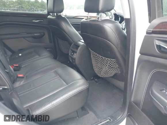 2012 Cadillac SRX Performance Collection with VIN 3GYFNBE38CS547423, listed as a IAAI auction lot 42276365 with 157,786 mi miles and . Bid and sale history available at DreamBid. Image 8.