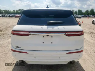 2021 Lincoln Corsair Reserve z VIN 5LMCJ2D96MUL21210, wystawiony jako Copart lot #59164185 z przebiegiem 57 578 mil mil oraz Szkoda całkowita • Salvage title. Historia ofert i sprzedaży dostępna na DreamBid. Obrazek 6.