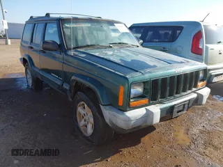 1999 Jeep Cherokee Sport with VIN 1J4FT68S6XL579735, listed as a IAAI auction lot 41484413 with 146,862 mi miles and . Bid and sale history available at DreamBid. Image 6.