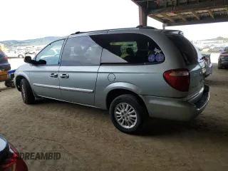 2004 Chrysler Town & Country EX with VIN 2C8GP74L94R576719, listed as a Copart auction lot 49922715 with 182,547 mi miles and Salvage Title. Bid and sale history available at carsss.com. Image 2.