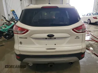 2016 Ford Escape SE with VIN 1FMCU9G98GUA57054, listed as a Copart auction lot 45194475 with 143,864 mi miles and Clean Title. Bid and sale history available at DreamBid. Image 6.