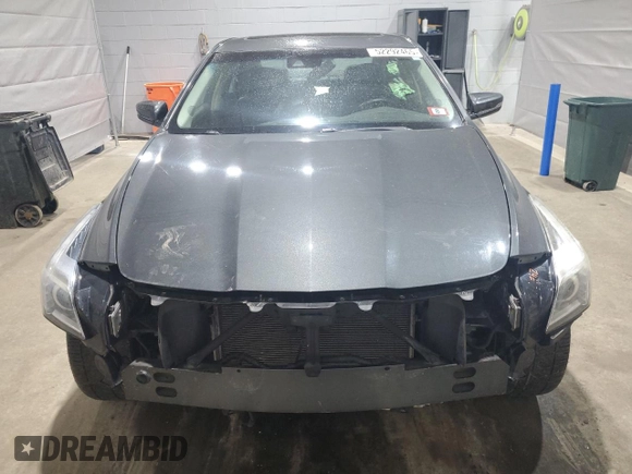 2014 Cadillac CTS Luxury AWD z VIN 1G6AX5SX5E0185132, wystawiony jako Copart lot #52292465 z przebiegiem 69 344 mil mil oraz Szkoda całkowita • Salvage title. Historia ofert i sprzedaży dostępna na DreamBid. Obrazek 5.