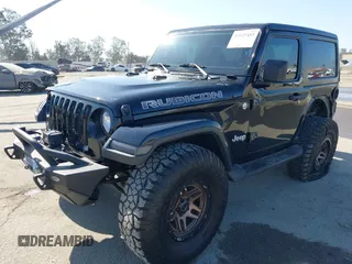 2018 Jeep Wrangler Sport with VIN 1C4GJXANXJW302523, listed as a IAAI auction lot 42527455 with 101,320 mi miles and . Bid and sale history available at DreamBid. Image 2.