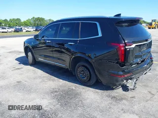 2020 Cadillac XT6 FWD Premium Luxury with VIN 1GYKPCRS7LZ211197, listed as a IAAI auction lot 42231424 with 57,351 mi miles and . Bid and sale history available at DreamBid. Image 3.