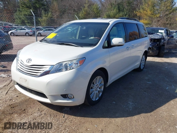 2014 Toyota Sienna Ltd with VIN 5TDDK3DC0ES090160, listed as a IAAI auction lot 41763998 with 160,508 mi miles. Bid and sale history available at carsss.com. Image 2.