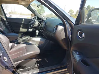 2014 Nissan Juke S with VIN JN8AF5MV9ET483956, listed as a IAAI auction lot 41803318 with 118,221 mi miles. Bid and sale history available at carsss.com. Image 5.
