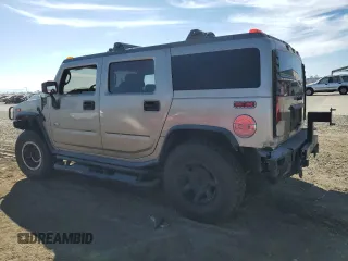 2005 Hummer H2 SUV with VIN 5GRGN23U85H113194, listed as a Copart auction lot 78012304 with 148,940 mi miles and Salvage Title. Bid and sale history available at carsss.com. Image 2.