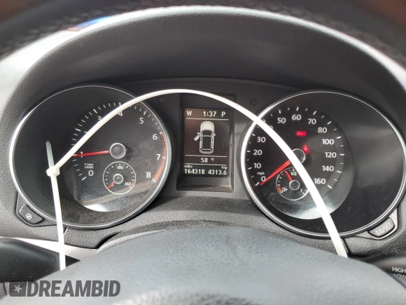 2010 Volkswagen Golf с VIN WVWDB7AJ9AW404313, выставлен на аукционе Copart как лот 74779244 с пробегом 164 318 миль миль и Списание • Salvage title. История ставок и продаж доступна на DreamBid. Изображение 9.