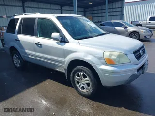 2003 Honda Pilot EX with VIN 2HKYF18613H539217, listed as a IAAI auction lot 41696214 with 329,118 mi miles. Bid and sale history available at carsss.com. Image 1.