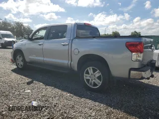 2012 Toyota Tundra 4WD Truck LTD with VIN 5TFHY5F15CX238124, listed as a Copart auction lot 69297994 with 165,591 mi miles and Salvage Title. Bid and sale history available at carsss.com. Image 2.
