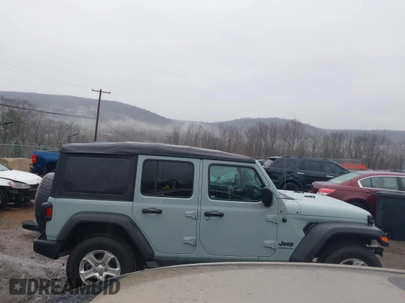 2023 Jeep Wrangler Sport S with VIN 1C4HJXDN5PW609316, listed as a IAAI auction lot 40960863 with 15,614 mi miles and . Bid and sale history available at DreamBid. Image 13.