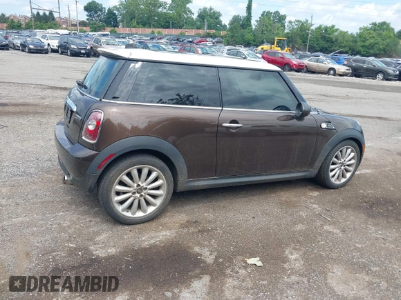 2010 MINI Hardtop with VIN WMWMF3C55ATZ23127, listed as a IAAI auction lot 42667783 with 61,954 mi miles and . Bid and sale history available at DreamBid. Image 4.