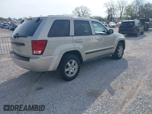 2008 Jeep Grand Cherokee Laredo with VIN 1J8GR48K88C107253, listed as a IAAI auction lot 42018165 with 239,222 mi miles. Bid and sale history available at carsss.com. Image 4.