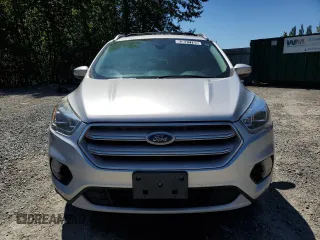 2019 Ford Escape Titanium z VIN 1FMCU0J92KUB62184, wystawiony jako Copart lot #63027765 z przebiegiem 136 005 mil mil oraz Czysty tytuł • Clean title. Historia ofert i sprzedaży dostępna na DreamBid. Obrazek 5.