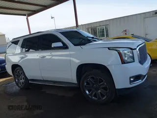 2019 GMC Yukon SLT with VIN 1GKS2BKC5KR109529, listed as a IAAI auction lot 41559860 with 136,025 mi miles. Bid and sale history available at carsss.com. Image 14.