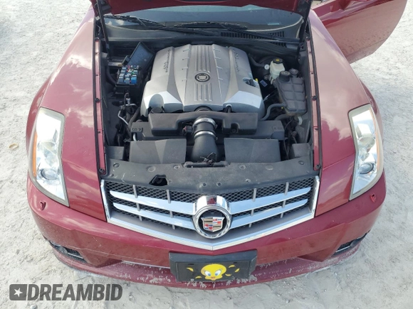 2009 Cadillac XLR Platinum z VIN 1G6YV36A595600621, wystawiony jako Copart lot #75302454 z przebiegiem Nie podano mil oraz Szkoda całkowita • Salvage title. Historia ofert i sprzedaży dostępna na DreamBid. Obrazek 11.