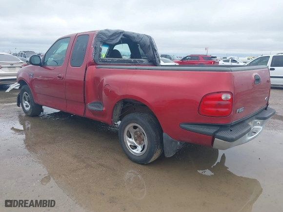 2000 Ford F-150 Work Series with VIN 1FTRX07W2YKA56826, listed as a IAAI auction lot 41527865 with 1 mi miles. Bid and sale history available at carsss.com. Image 3.