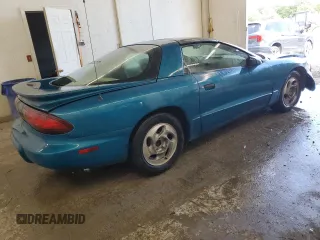 1995 Pontiac Firebird Firebird z VIN 2G2FS22S7S2240523, wystawiony jako Copart lot #57970545 z przebiegiem 119 682 mil mil oraz Szkoda całkowita • Salvage title. Historia ofert i sprzedaży dostępna na DreamBid. Obrazek 3.