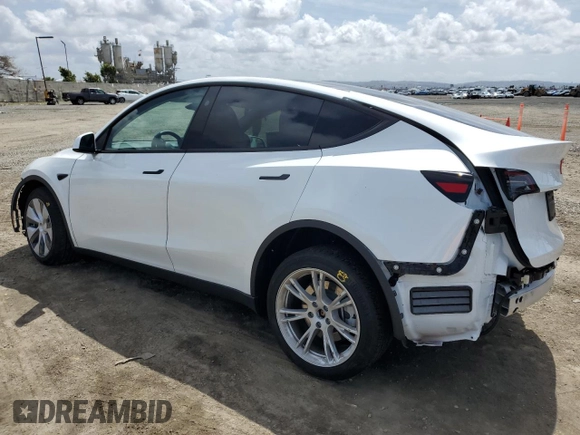 2024 Tesla Model Y z VIN 7SAYGDED4RF054565, wystawiony jako Copart lot #51188065 z przebiegiem 10 540 mil mil oraz Szkoda całkowita • Salvage title. Historia ofert i sprzedaży dostępna na DreamBid. Obrazek 2.