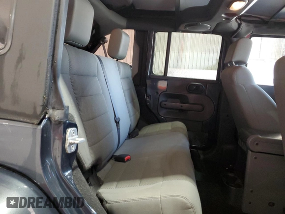 2007 Jeep Wrangler Unlimited Sahara с VIN 1J8GA591X7L217299, выставлен на аукционе Copart как лот 61984395 с пробегом 151 171 миль миль и Списание • Salvage title. История ставок и продаж доступна на DreamBid. Изображение 10.