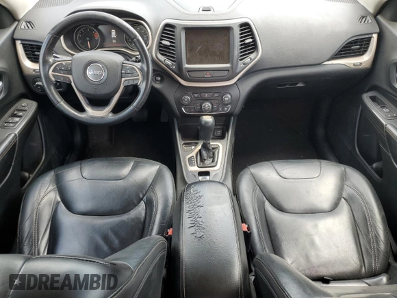 2016 Jeep Cherokee Limited with VIN 1C4PJLDB0GW287372, listed as a Copart auction lot 52795535 with 173,038 mi miles and Salvage title. Bid and sale history available at DreamBid. Image 8.