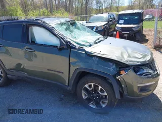 2018 Jeep Compass Trailhawk with VIN 3C4NJDDB0JT241163, listed as a IAAI auction lot 41986193 with 89,246 mi miles and . Bid and sale history available at DreamBid. Image 14.