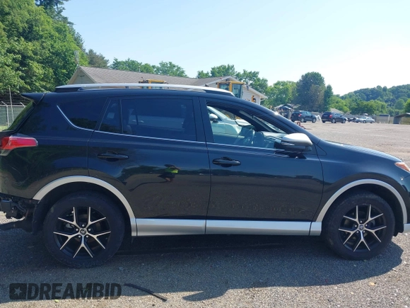 2016 Toyota RAV4 SE with VIN JTMJFREV2GJ089599, listed as a IAAI auction lot 42551300 with 90,352 mi miles and . Bid and sale history available at DreamBid. Image 14.