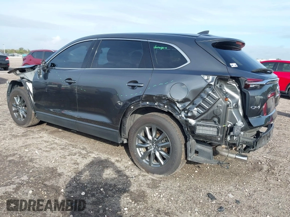 2020 Mazda CX-9 Touring z VIN JM3TCACY5L0412308, wystawiony jako IAAI lot #41208401 z przebiegiem 37 029 mil mil oraz . Historia ofert i sprzedaży dostępna na DreamBid. Obrazek 3.