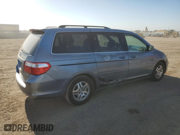 2005 Honda Odyssey EX-L with VIN 5FNRL38765B072878, listed as a Copart auction lot 54610815 with 271,460 mi miles and Salvage title. Bid and sale history available at DreamBid. Image 3.