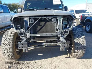 2018 Jeep Wrangler Unlimited Sahara with VIN 1C4HJXEG8JW239535, listed as a IAAI auction lot 41711596 with 85,675 mi miles. Bid and sale history available at carsss.com. Image 6.