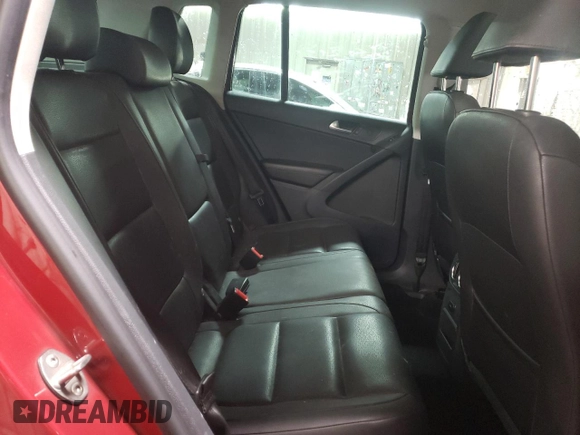 2013 Volkswagen Tiguan SE z VIN WVGBV3AX8DW092397, wystawiony jako Copart lot #51956225 z przebiegiem 138 901 mil mil oraz Szkoda całkowita • Salvage title. Historia ofert i sprzedaży dostępna na DreamBid. Obrazek 10.