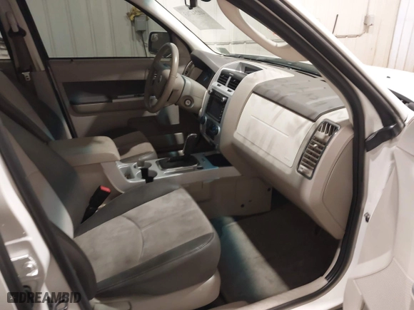 2011 Mercury Mariner Premier with VIN 4M2CN9HG3BKJ02026, listed as a IAAI auction lot 40254703 with 99,000 mi miles. Bid and sale history available at carsss.com. Image 5.